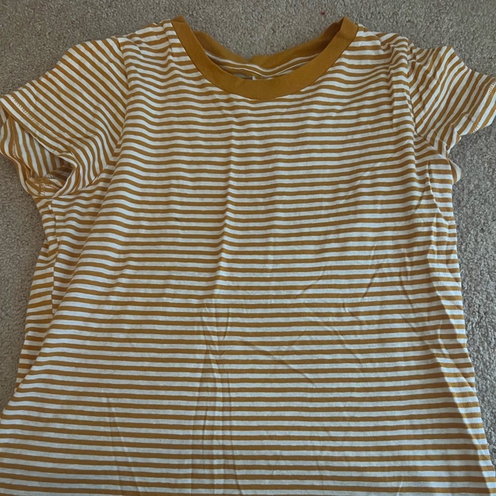 Yellow and white striped top.